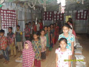 Students singing National Anthem